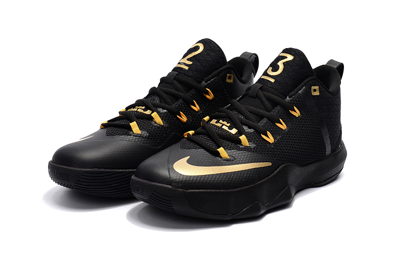 nike black gold shoes